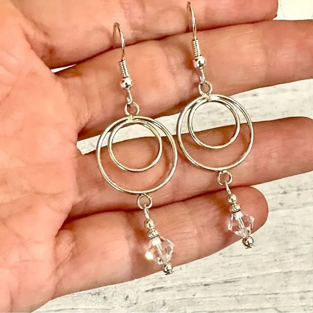 Silver tone crystal dangle earrings